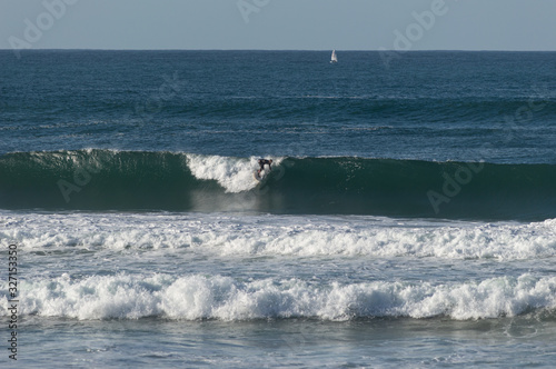 Photography Sport surfing on the beach of zurriola located in san sebastian spain