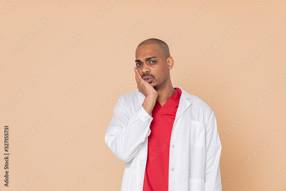 Worried doctor with red uniform Worried doctor with red uniform