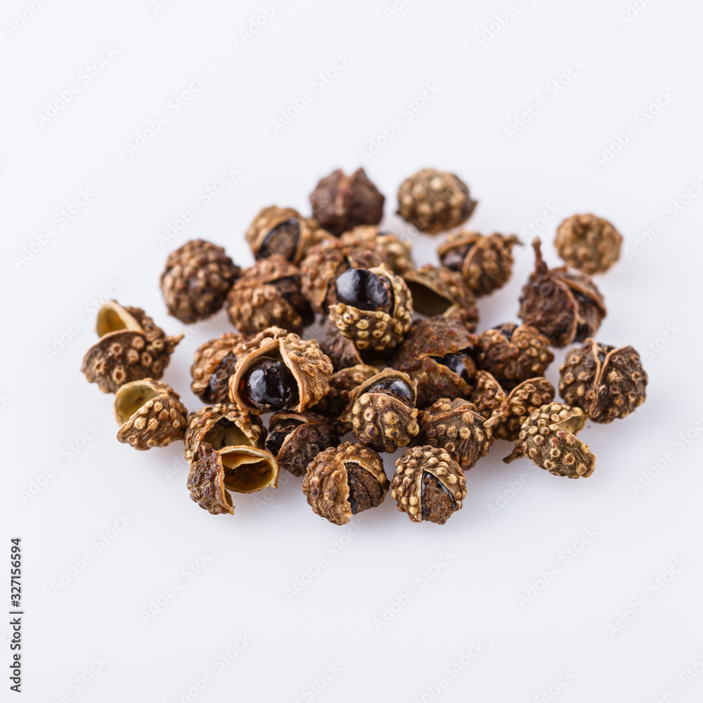 fragrant Sichuan pepper on white acrylic background fragrant Sichuan pepper on white acrylic background