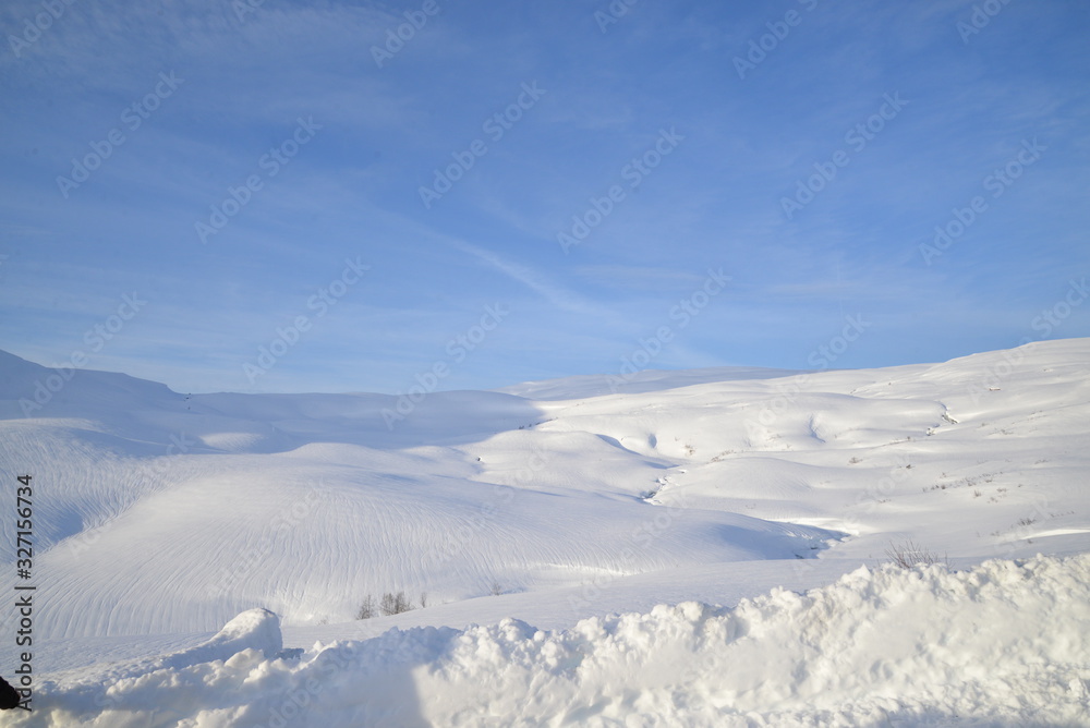 winter landscape with mountains and blue sky winter landscape with mountains and blue sky