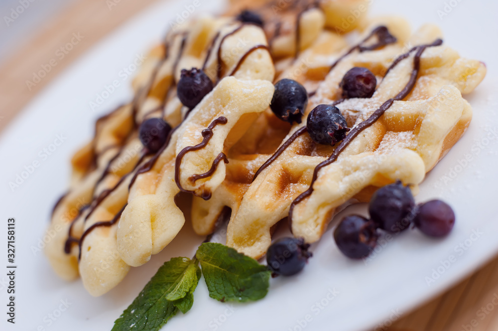 Belgian waffles with fresh berries and mint Belgian waffles with fresh berries and mint