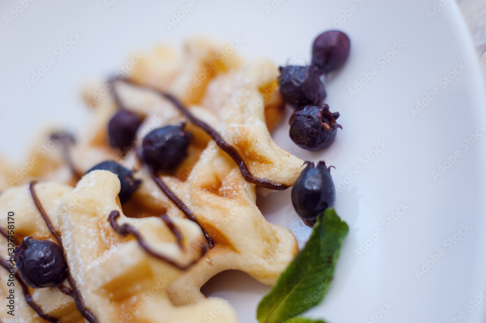 Belgian waffles with fresh berries and mint Belgian waffles with fresh berries and mint