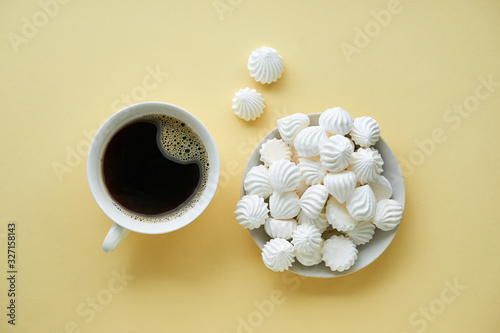 Coffee with bizet on a light background photo