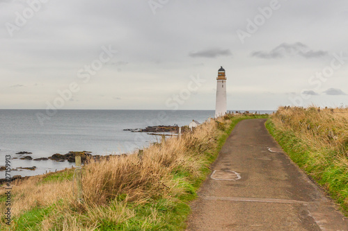 MONTROSE, SCOTLAND - 2015 OCTOBER 25. Walking path to Scurdie Ness Lighthouse.