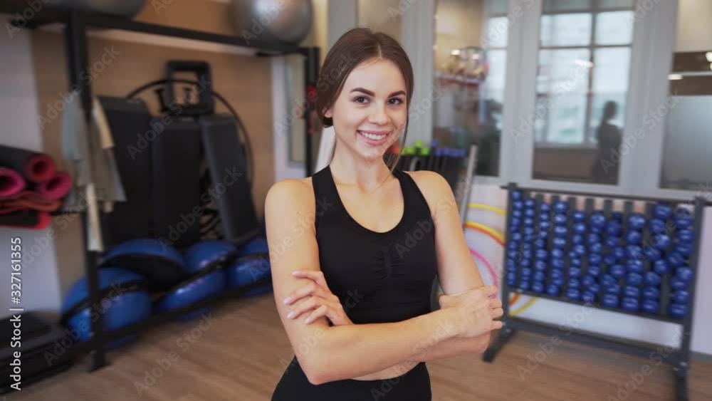 4x slow motion video of Beautiful young woman working out and stretching indoors 4x slow motion video of Beautiful young woman working out and stretching indoors