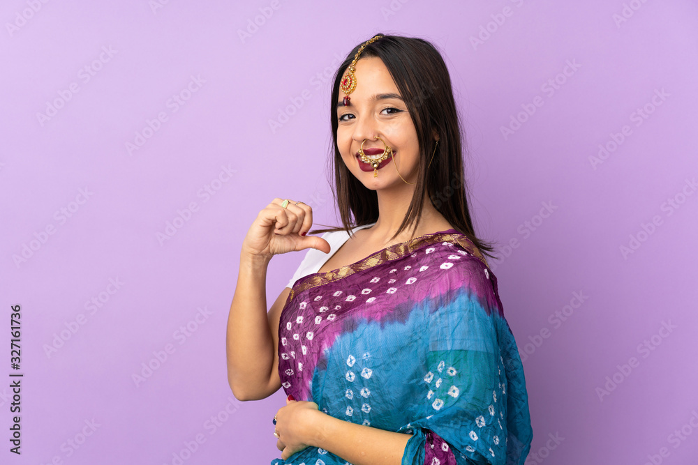 Young Indian woman isolated on purple background proud and self-satisfied Young Indian woman isolated on purple background proud and self-satisfied