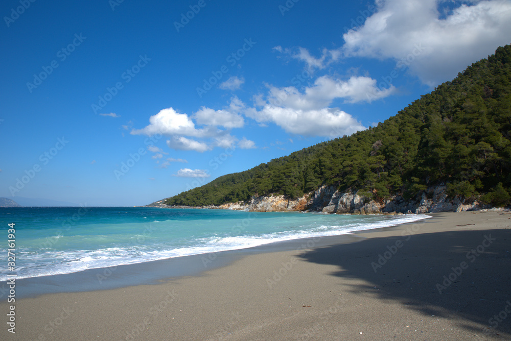 A beautiful beach on the island of Skopelos, Greece . her name is Kastani beach