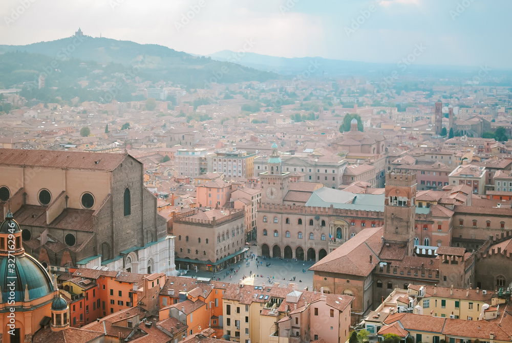 Aerial panoramic cityscape of Bologna, Italy. Rooftops of typical houses, ancient buildings and medieval towers