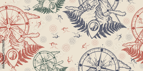Mountains and compass. Seamless pattern. Packing old paper, scrapbooking style. Vintage background. Medieval manuscript, engraving art. Symbol of tourism, rock climbing, camping