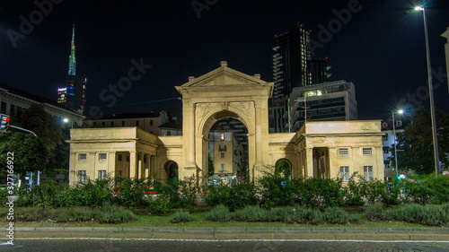 The Porta Nuova city gates night timelapse  in Milan Italy photo