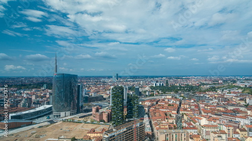 Milan aerial view of modern towers and skyscrapers and the Garibaldi railway station in the business district timelapse