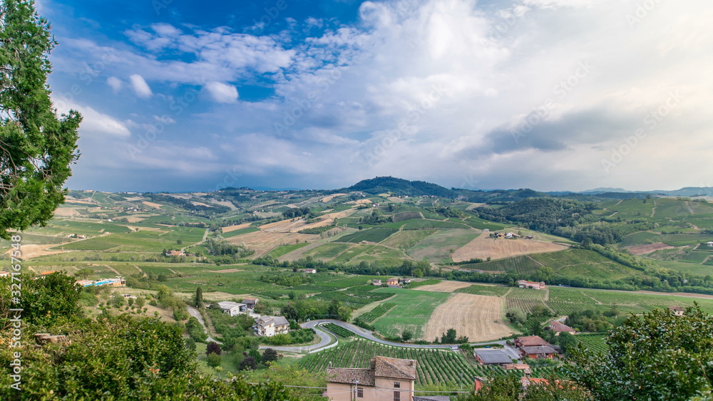 view of green summer valley of italian coyntryside timelapse with hills on background