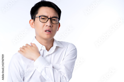sick asian glasses male adult feel shoulder pain  hand touch shoulder muscle with stressful and tension white background office syndrome ideas concept