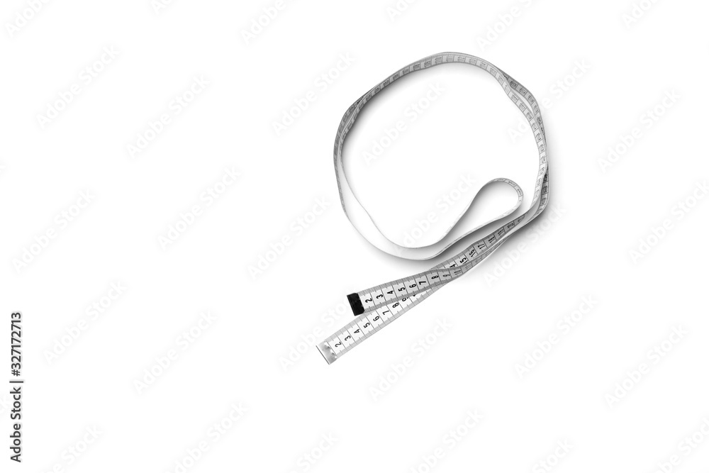 The figure is loop of a centimeter tape. Isolate measuring tape on a white background. The figure is loop of a centimeter tape. Isolate measuring tape on a white background.