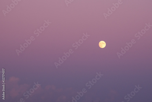 Purple night sky and moon ligh
