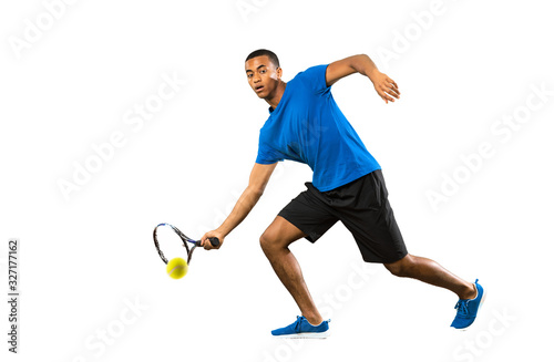 Full-length shot of African American tennis player man over isolated white background