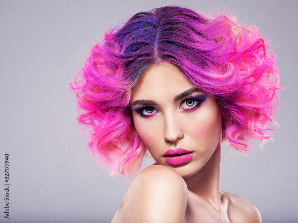 Portrait of beautiful young woman with bright pink makeup. Beautiful blonde with bright pink lipstick on her lips. Pretty girl with vivid hair. Blonde with brightly colored hair. Bright eye makeup. Portrait of beautiful young woman with bright pink makeup. Beautiful blonde with bright pink lipstick on her lips. Pretty girl with vivid hair. Blonde with brightly colored hair. Bright eye makeup.