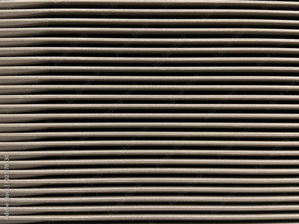 Repetition of small lines pattern in light brown and black lay horizontally for background and texture Repetition of small lines pattern in light brown and black lay horizontally for background and texture