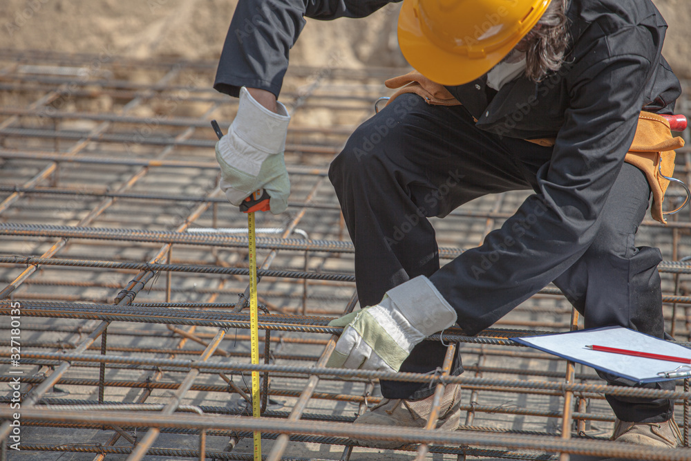 inspector checks the construction parameters of foundation inspector checks the construction parameters of foundation