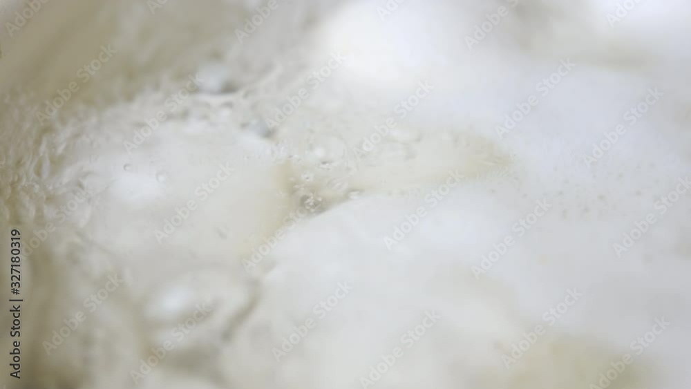 Top view close-up of chicken eggs boiled in a pan in the kitchen on the stove. Cooking food. Top view close-up of chicken eggs boiled in a pan in the kitchen on the stove. Cooking food.