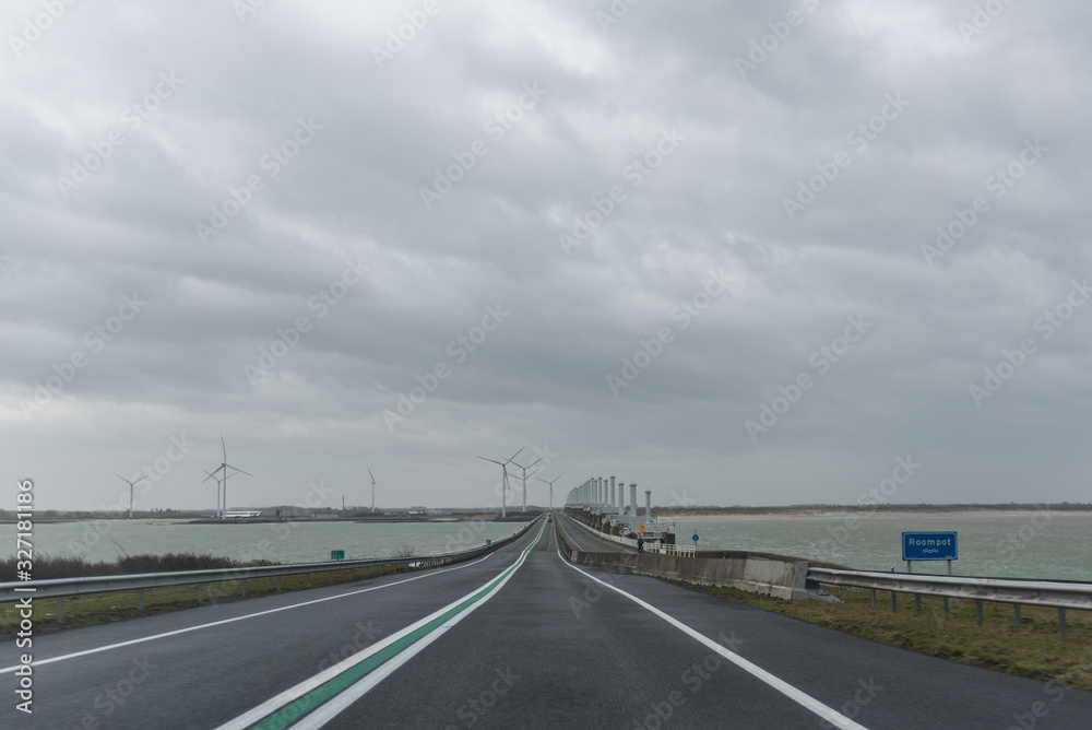 The Delta Works (Dutch: Deltawerken) is a series of construction projects in the southwest of the Netherlands to protect a large area of land around the Rhine-Meuse-Schelde delta from the sea. The Delta Works (Dutch: Deltawerken) is a series of construction projects in the southwest of the Netherlands to protect a large area of land around the Rhine-Meuse-Schelde delta from the sea.