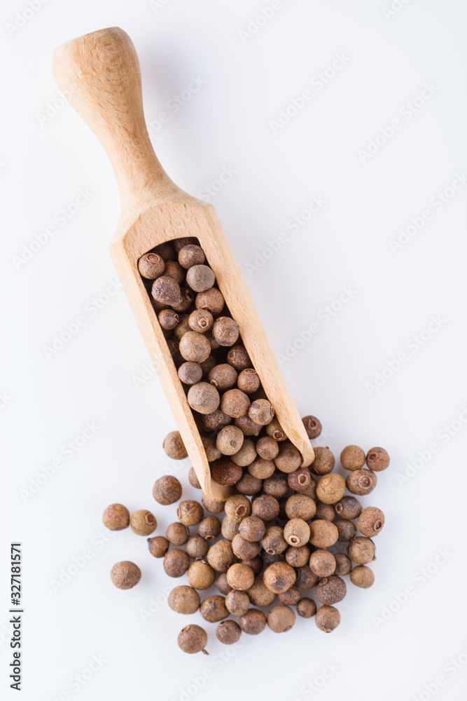 fresh spicy peppers allspice on white acrylic background fresh spicy peppers allspice on white acrylic background