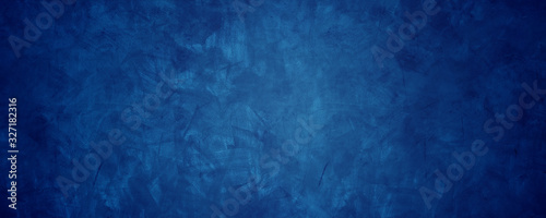 Fototapeta dark blue grunge cement wall background.