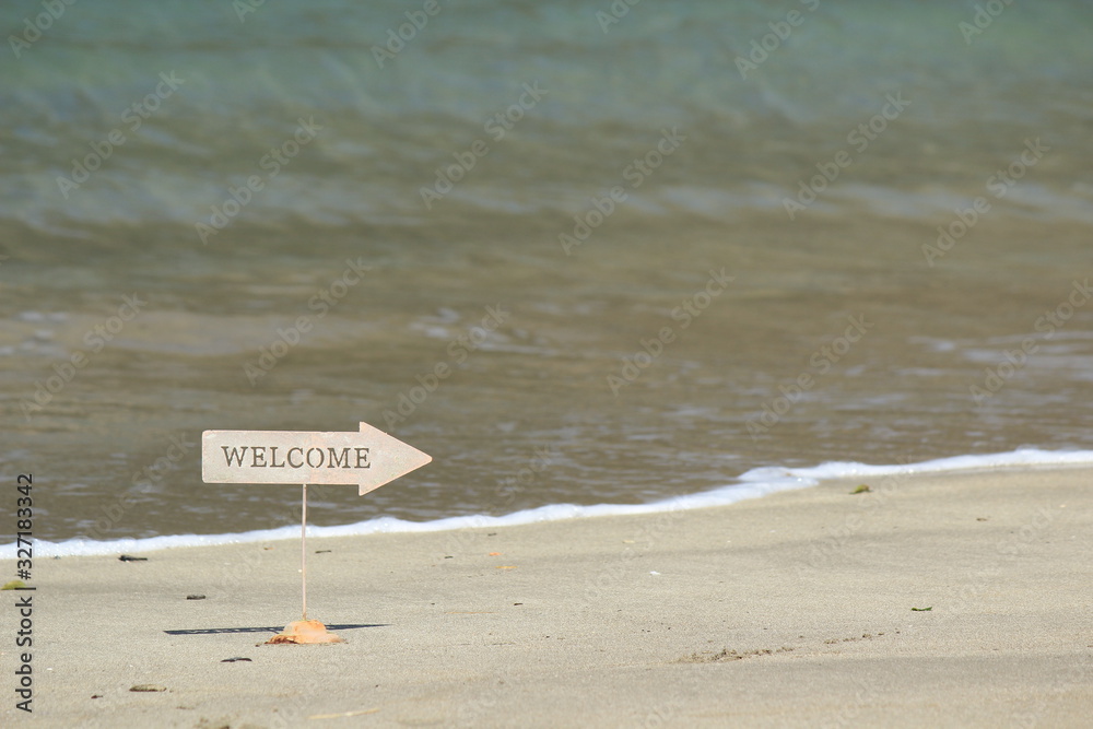 Naklejka premium 海辺のWELCOMEサインボード
