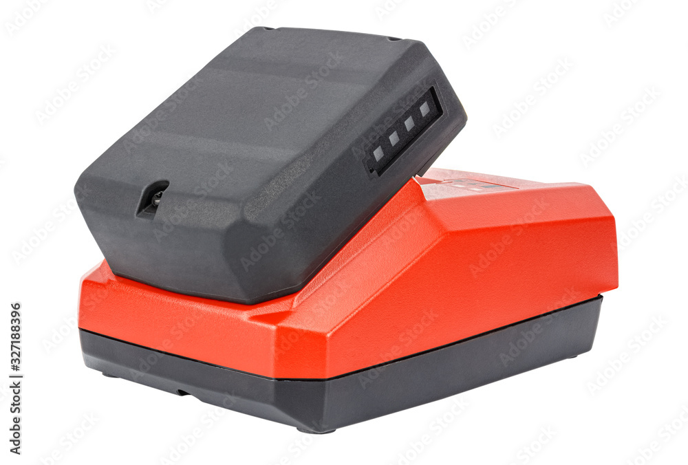 Compact charger with connected 12V Li-ion battery in rubberized and glass-fiber reinforced casing with charge level display isolated on white background. Cut out construction tool image Compact charger with connected 12V Li-ion battery in rubberized and glass-fiber reinforced casing with charge level display isolated on white background. Cut out construction tool image