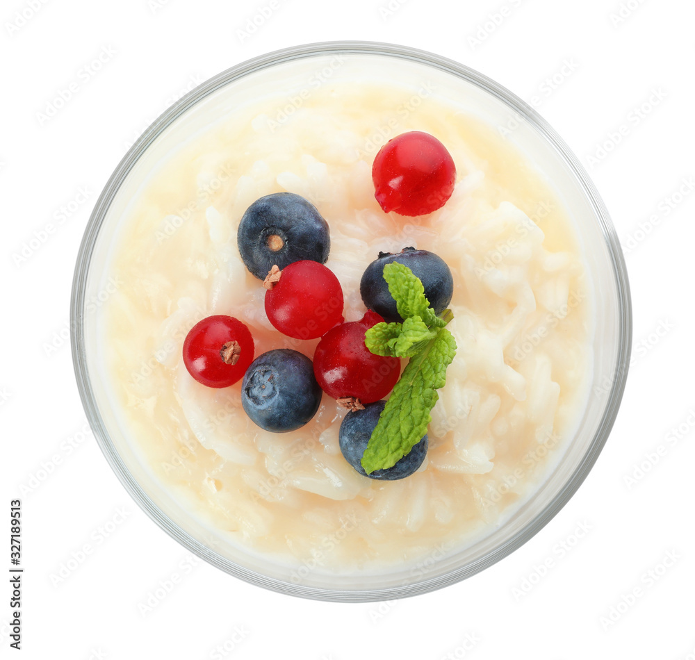 Delicious rice pudding with berries isolated on white, top view Delicious rice pudding with berries isolated on white, top view