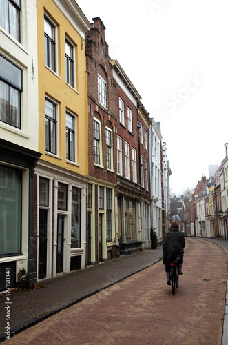 Man riding a bike on a Utrecht street
