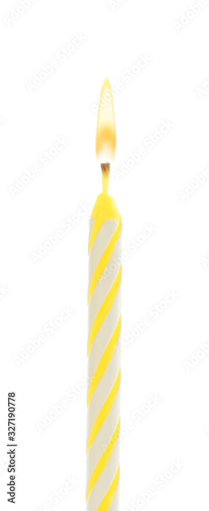 Yellow birthday cake candle isolated on white Yellow birthday cake candle isolated on white