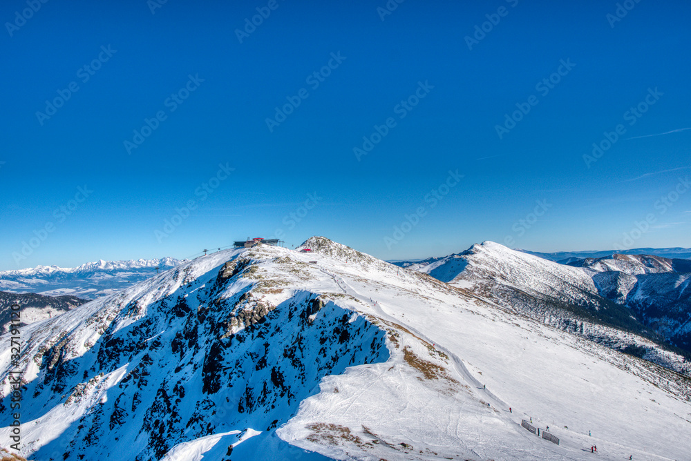 snowy mountains at clear day in slovakia in low tatras, slovakia tatras