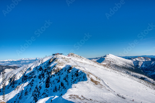 Fototapeta Naklejka Na Ścianę i Meble -  snowy mountains at clear day in slovakia in low tatras, slovakia tatras