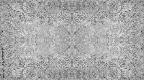 Old gray vintage shabby patchwork tiles stone concrete cement wall texture background