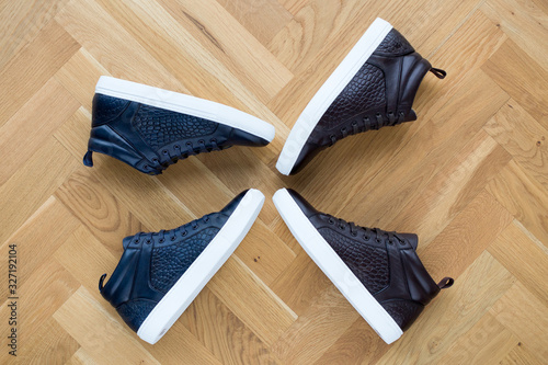 stylish men's shoes. men fashion still life. different boots, sneakers