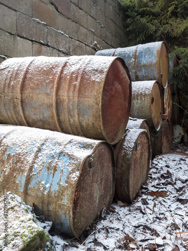 Pile of old barrels outdoors
