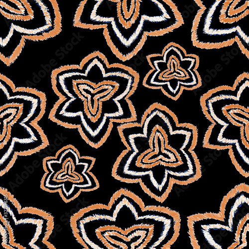 Creative seamless pattern with hand drawn ikat stars. Ethnic boho seamless pa...