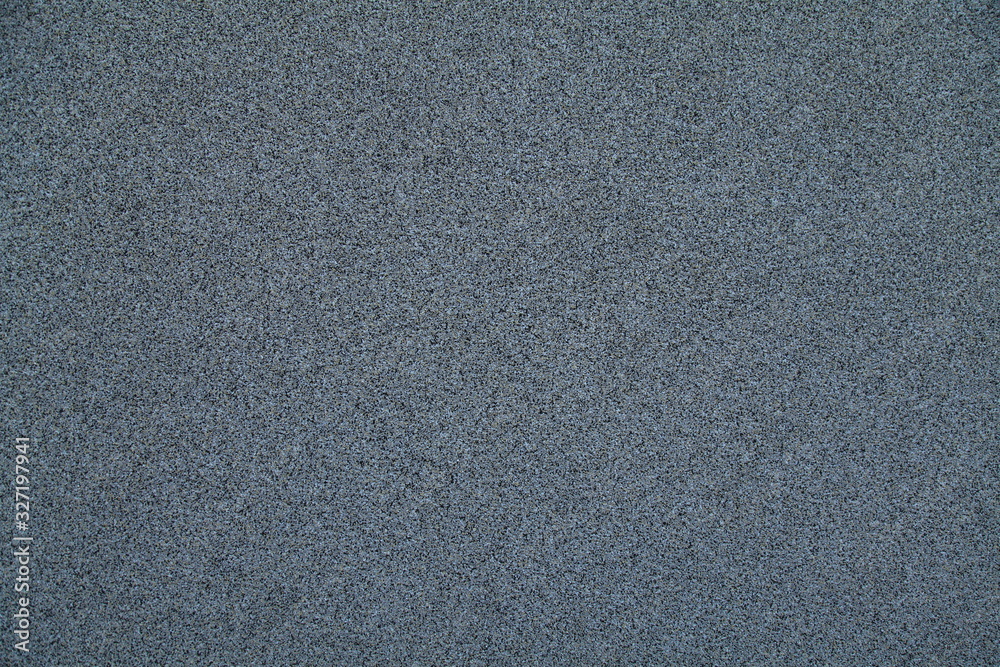 Mosaic and granulated textured coating, texture, background. Structural plaster, rough, uneven surface in gray color. Modern exterior cladding of multi-story buildings Mosaic and granulated textured coating, texture, background. Structural plaster, rough, uneven surface in gray color. Modern exterior cladding of multi-story buildings