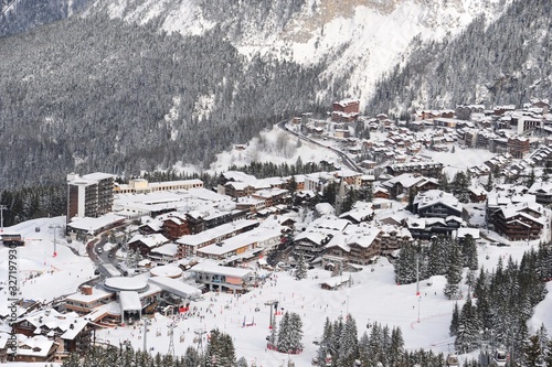 Areal view of Courchevel ski resort village in winter