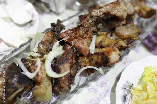 Pork kebab with onions