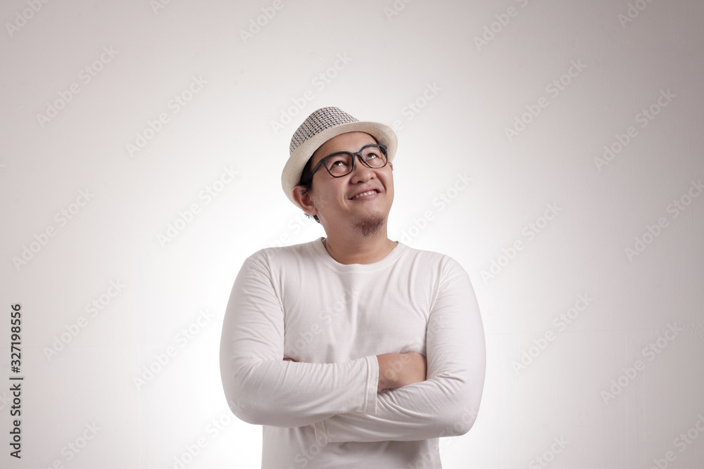 Young Man Thinking and Looking Up, Having Good Idea Young Man Thinking and Looking Up, Having Good Idea