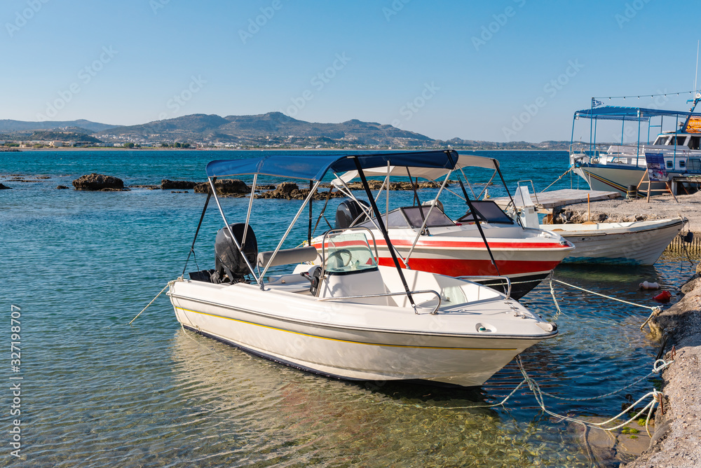 Motor boats for sea cruises on the beach in Kolymbia, Rhodes. Greece