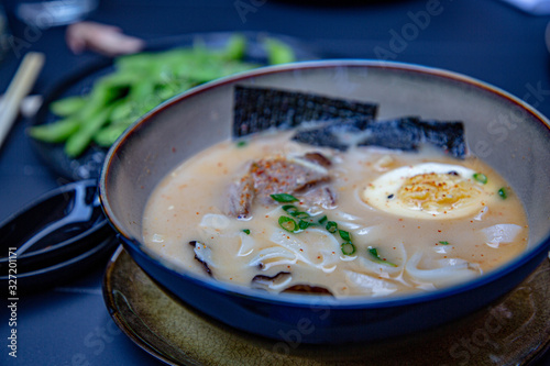 Traditional Japanese ramen soup with pork broth with noodles and egg.
