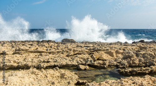 waves splashing on a rocky shore