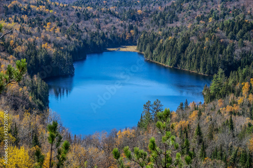 Aerial view of a blue lake located in the Mauricie national park, Canada