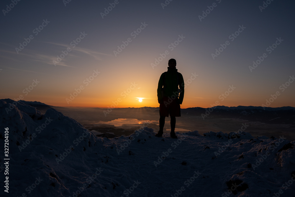 Dark landscape and figure at sunrise with fog in valley, Slovakia Fatra landscape and figure at sunrise with fog in valley, Slovakia Fatra