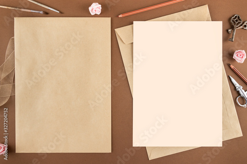 An envelope and a letter on a vintage craft table with space for text