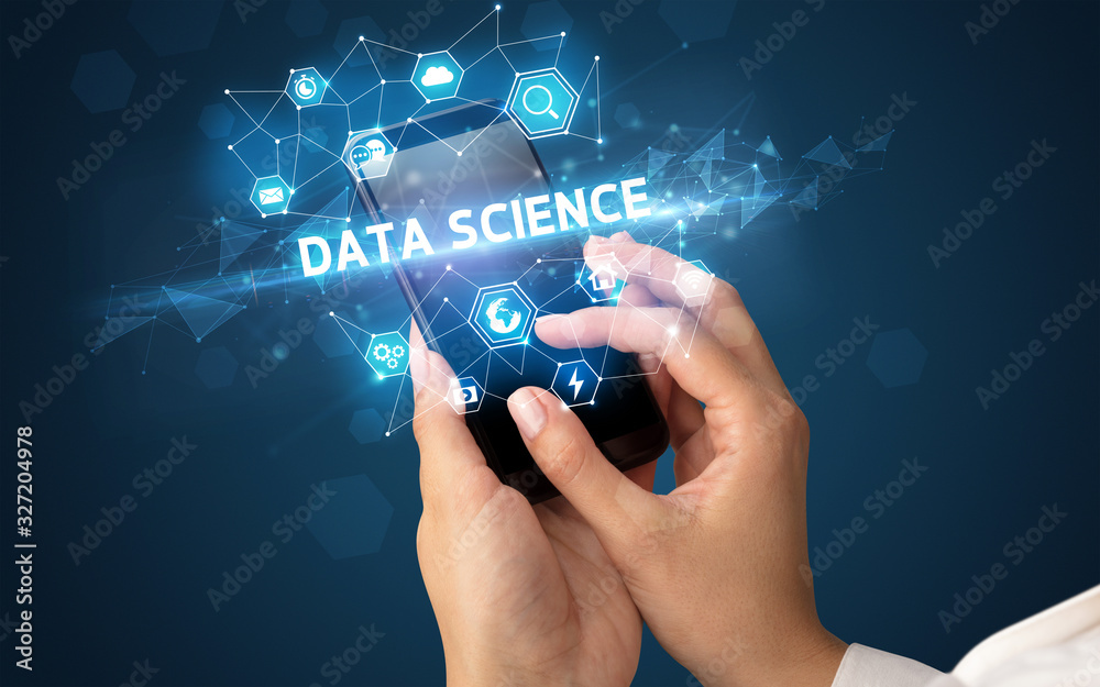 Fototapeta premium Female hand holding smartphone with DATA SCIENCE inscription, modern technology concept