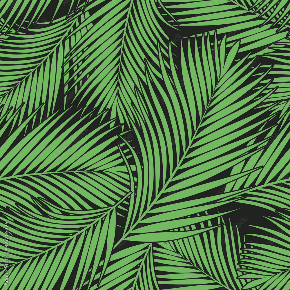 Fototapeta premium Green tropical palm leaves texture on dark backdrop